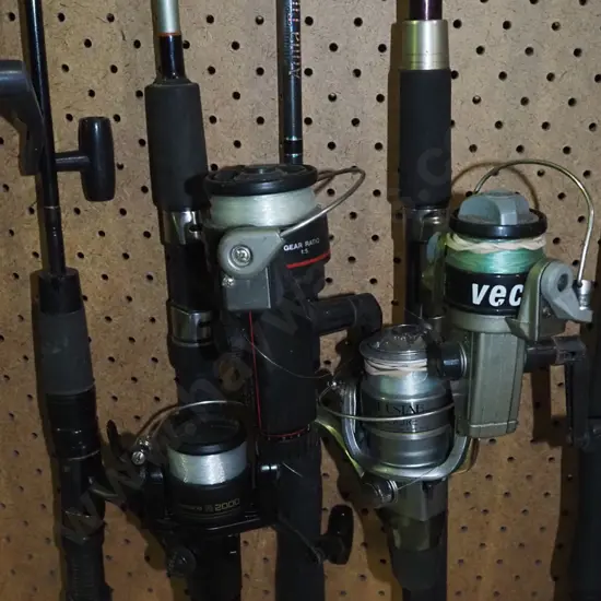 4x fishing rods and reels - yellow dots