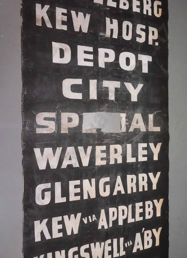 vintage Invercargill fabric bus blind on metal rollers - white on black lettering, significant wear and areas of damage, Image 1++