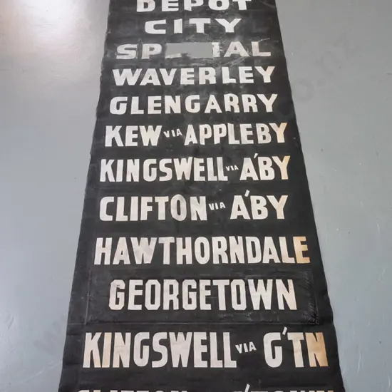 vintage Invercargill fabric bus blind on metal rollers - white on black lettering, significant wear and areas of damage,
