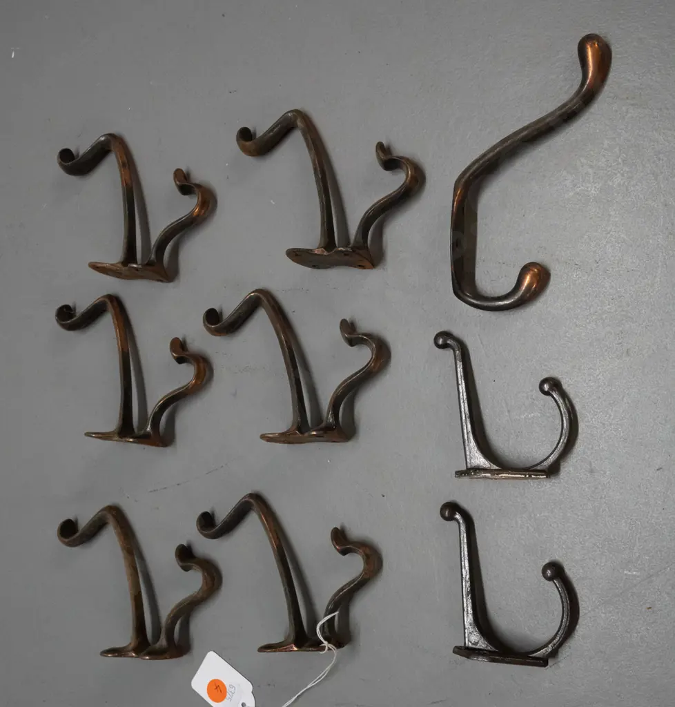 9 vintage cast metal double coat hooks - assorted shapes, some copper finish, some surface corrosion, larger are Image 1++