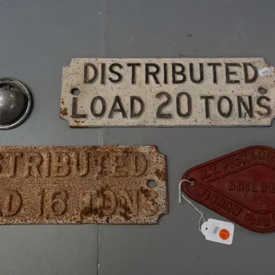 2 cast metal plaques - Distributed Load 20 Tons and another in corroded condition Distributed Load 16 Tons - and a small