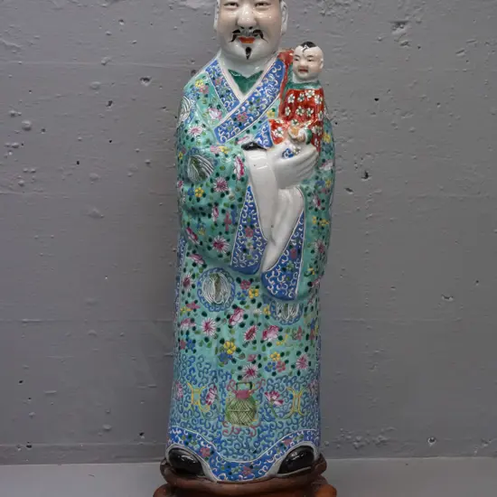 Chinese porcelain lamp base with wooden stand, no lamp fittings, hole thru base. Timber has a few chips. Figure H-490