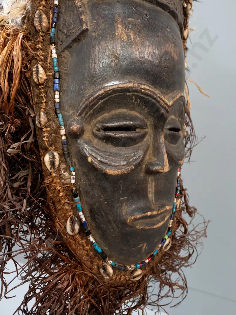 painted and carved wooden mask - Chokwe people, Angola/Congo - w/ beads, shells, feathers and raffia. Some deterioration Image 1++