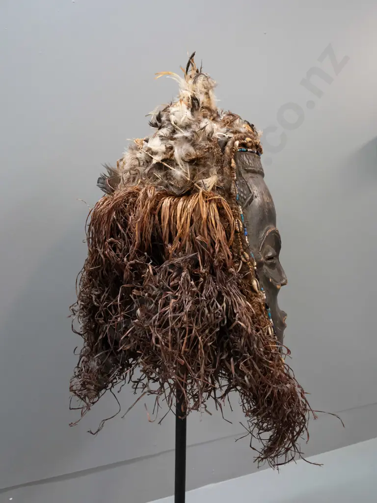 painted and carved wooden mask - Chokwe people, Angola/Congo - w/ beads, shells, feathers and raffia. Some deterioration Image 1++