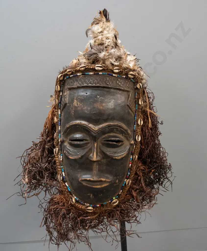 painted and carved wooden mask - Chokwe people, Angola/Congo - w/ beads, shells, feathers and raffia. Some deterioration Image 1++