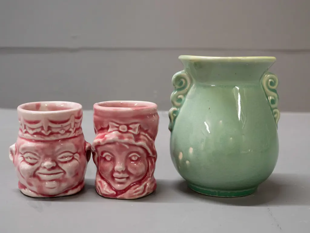 small (Crown Lynn?) vase marked .130. with a small glaze fault H-95 W-85 and 2 pink figural egg cups, one Image 1++