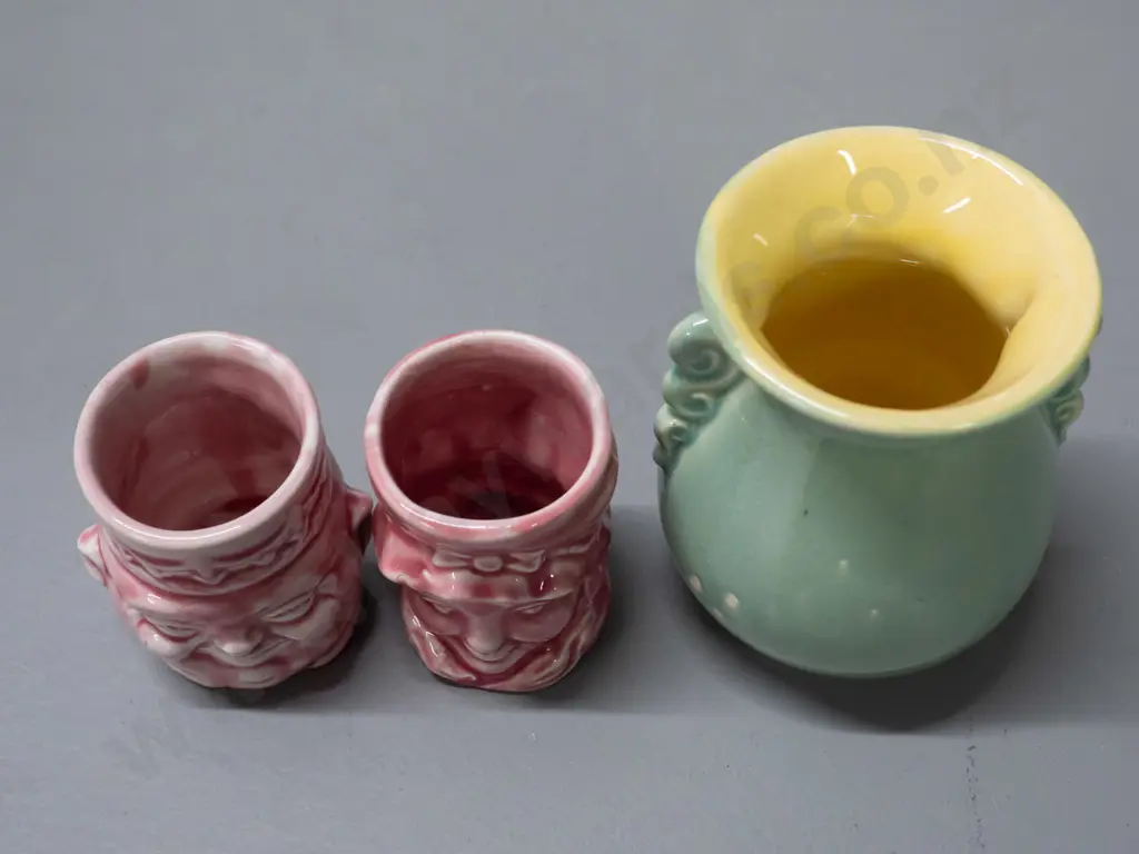 small (Crown Lynn?) vase marked .130. with a small glaze fault H-95 W-85 and 2 pink figural egg cups, one Image 1++