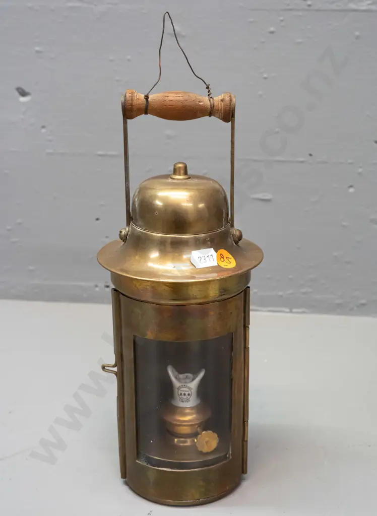 brass lantern with timber carry handle, curved glass door, ceramic and brass lamp insert - marked Sherwoods Ltd. H-260 Image 1++