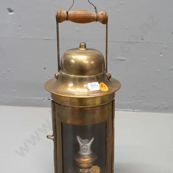 brass lantern with timber carry handle, curved glass door, ceramic and brass lamp insert - marked Sherwoods Ltd. H-260