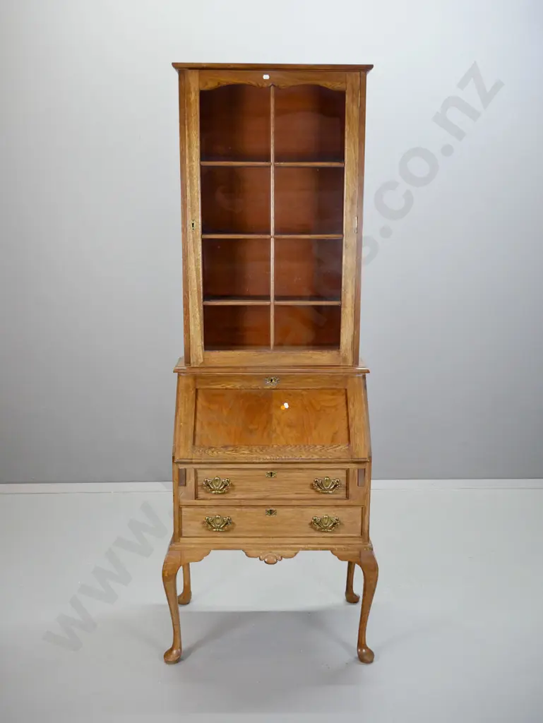 reproduction oak and elm cab-leg bookcase bureau w/swan neck pediment, glazed door w/wooden astragals, drop front Image 1++