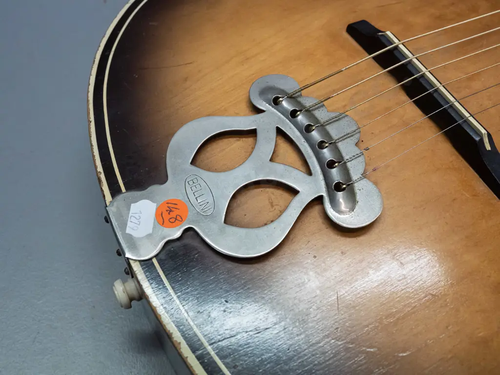 retro Bellini South African acoustic guitar in case - overall age wear, chips to finish, case is very worn. L-940 W-365 Image 1++