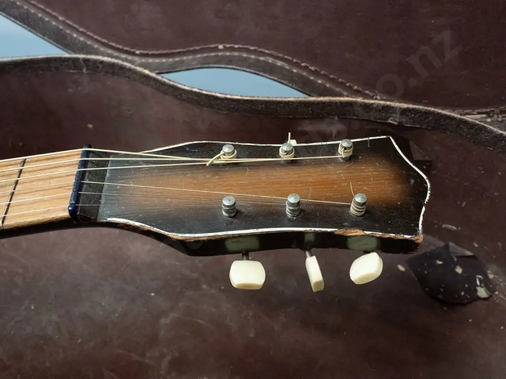 retro Bellini South African acoustic guitar in case - overall age wear, chips to finish, case is very worn. L-940 W-365 Image 1++