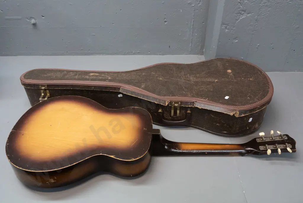 retro Bellini South African acoustic guitar in case - overall age wear, chips to finish, case is very worn. L-940 W-365 Image 1++