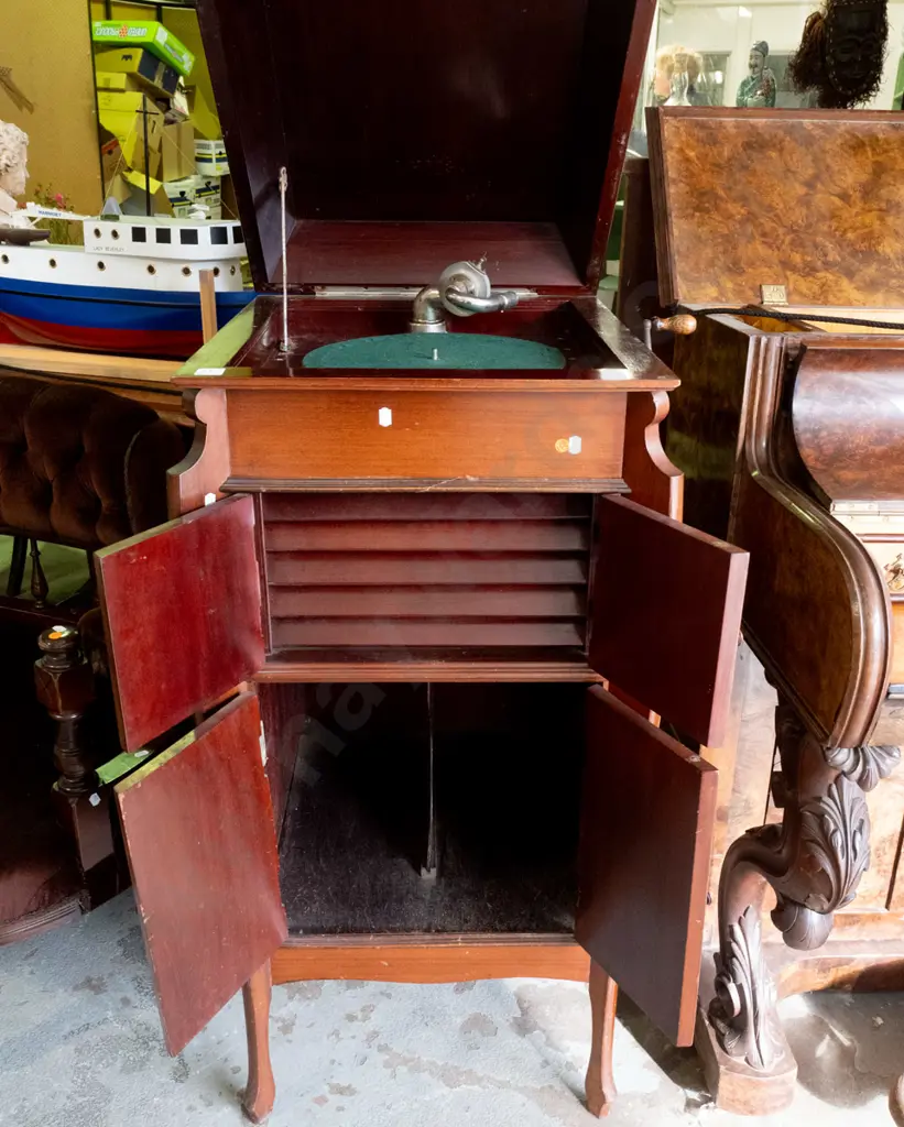 vintage wind-up gramophone in mahogany cabinet with 2 door record storage cupboard and 2 speaker cabinet doors, one w/ Image 1++