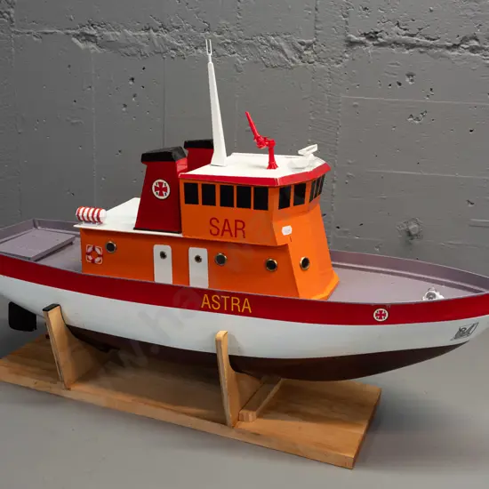 large motorised model boat - marked SAR & Astra, replica of Swedish search and rescue ship, on wooden stand, loose mast,