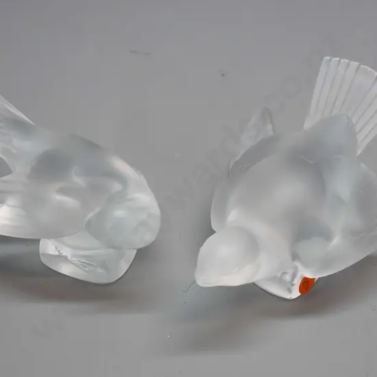 set of 2 Lalique frosted glass doves - both etched Lalique France on base - one has chips to tail and tip of one wing.