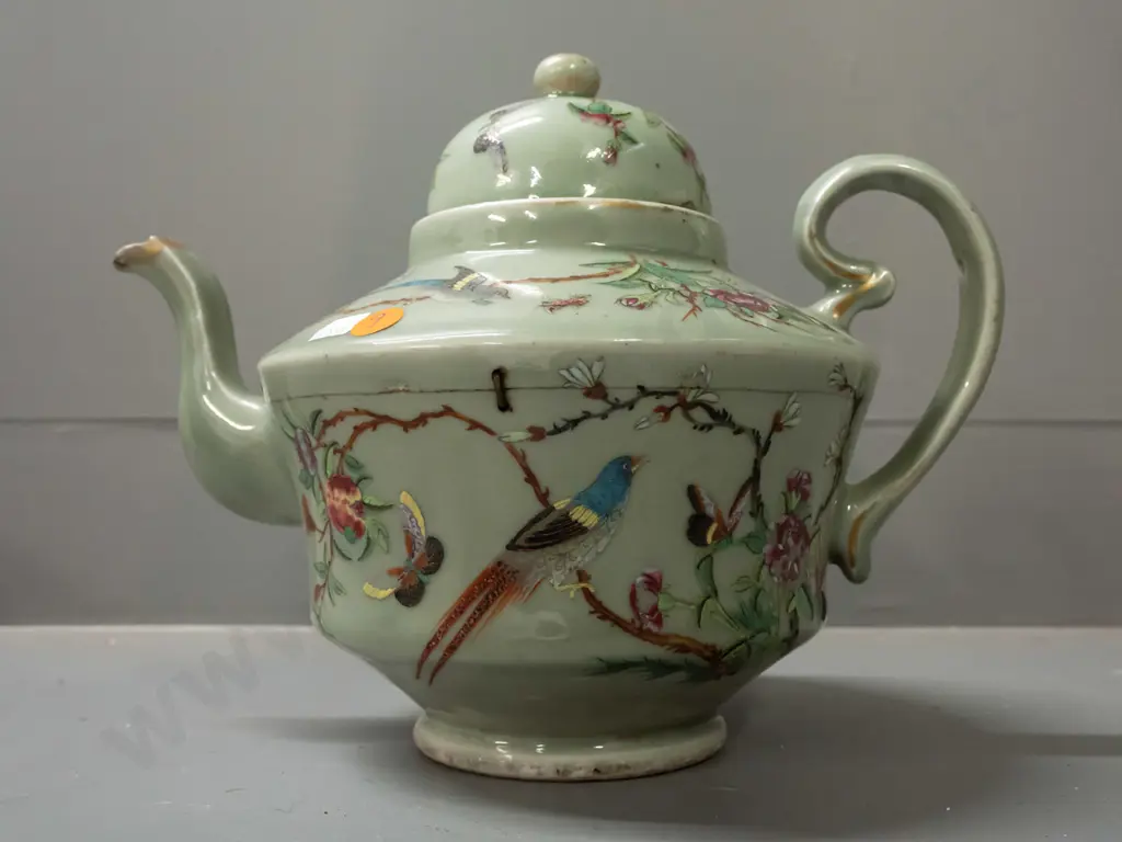 19th century Chinese teapot with raised enamel decoration - insects, birds, floral motifs on celadon ground. Has stapled Image 1++