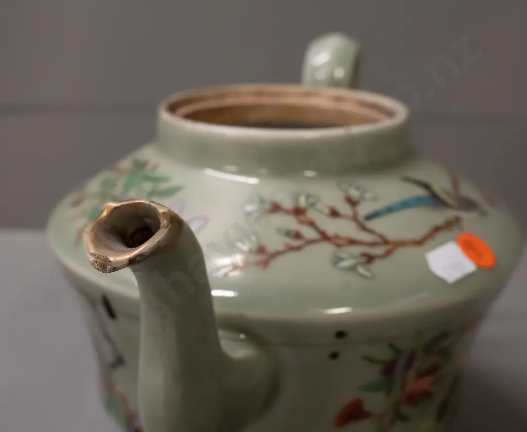 19th century Chinese teapot with raised enamel decoration - insects, birds, floral motifs on celadon ground. Has stapled Image 1++