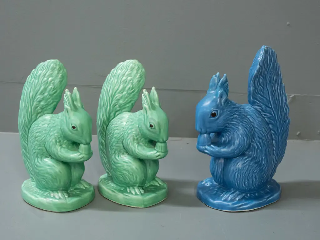 3 Sylvac squirrel figures - 2 green marked 1144 and blue marked 1145. Glaze nibbles to ears on both green ones and fleck Image 1++