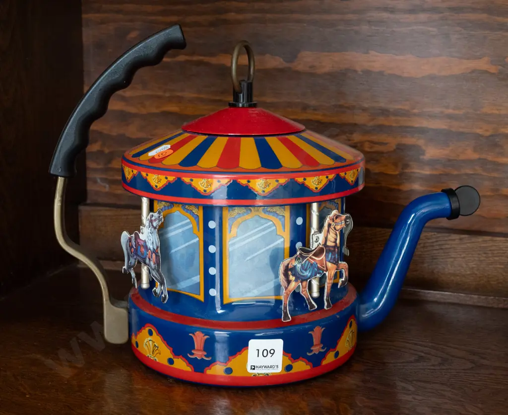 enamelled kettle with steam-driven carousel mechanism - some minor corrosion inside lid - mechanism untested Image 1++