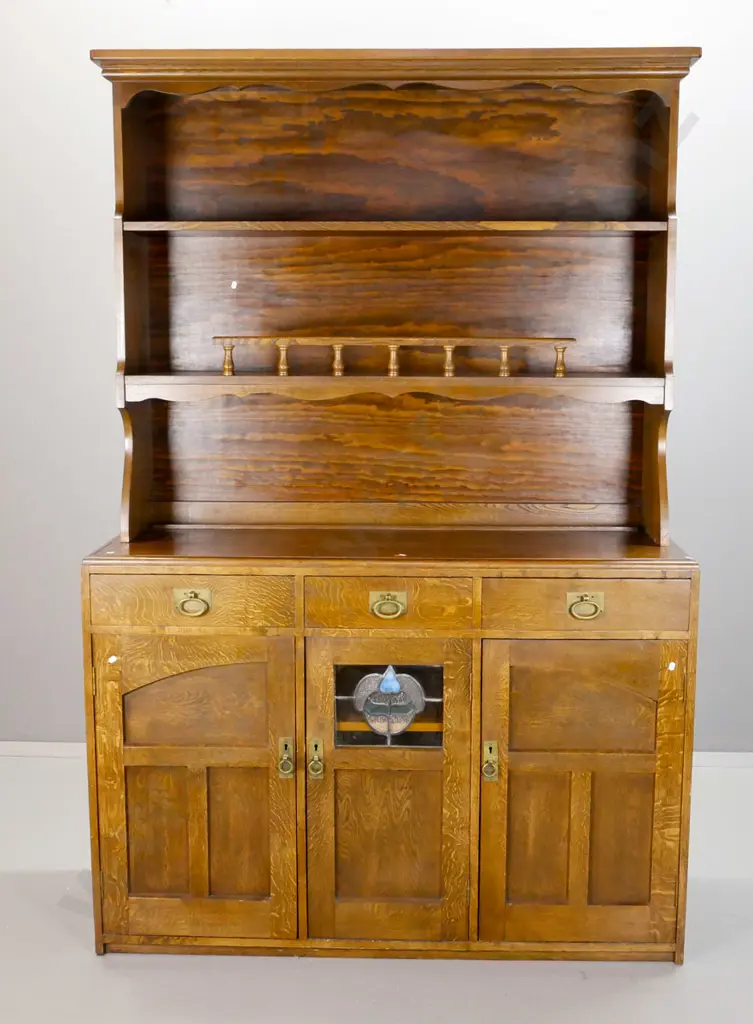 oak dresser with arts & crafts base and more modern added open-top section - 3 drawers over 3 panelled doors with brass Image 1++