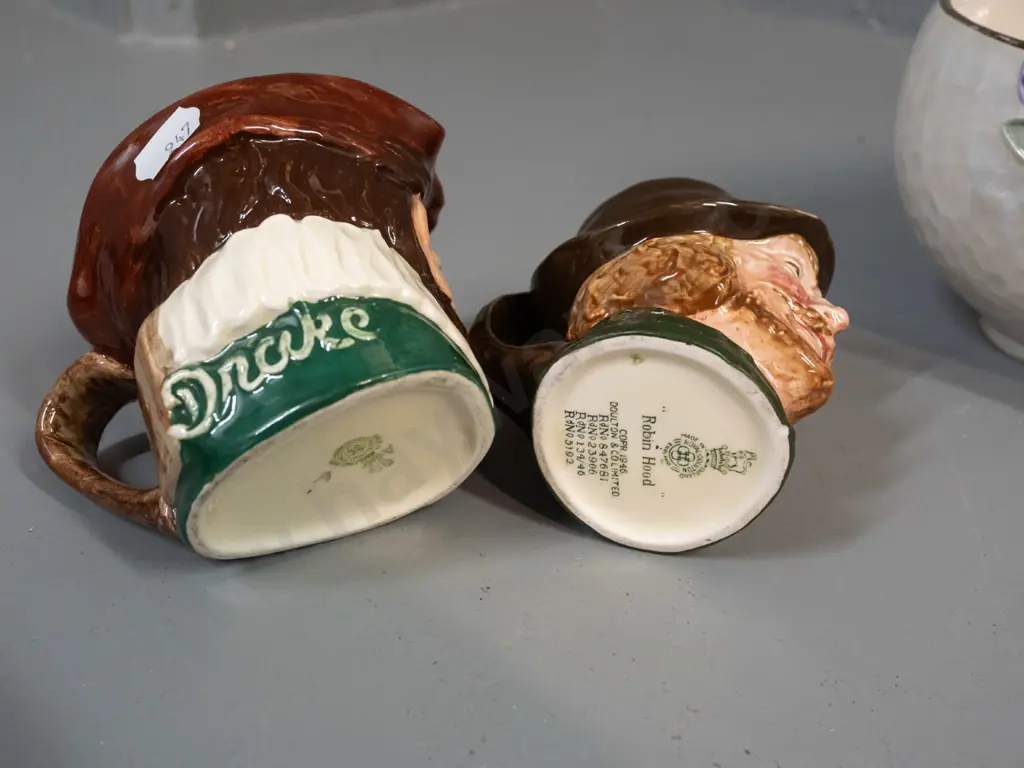 Maling lustre ware diamond shaped bowl & 2 Royal Doulton character jugs - Drake and Robin Hood. Some crazing to bowl. Image 1++