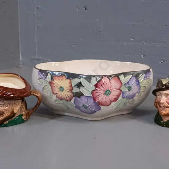 Maling lustre ware diamond shaped bowl & 2 Royal Doulton character jugs - Drake and Robin Hood. Some crazing to bowl.