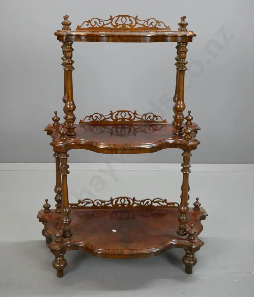 Victorian style walnut veneer 3-tier whatnot with turned supports and finials, pierced galleries, on squat turned feet Image 1++