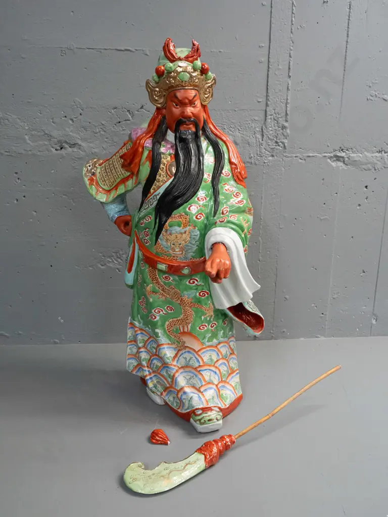 large Chinese heavy porcelain warrior figure with loose timber handled ceremonial staff - one hand loose, some chips and Image 1++