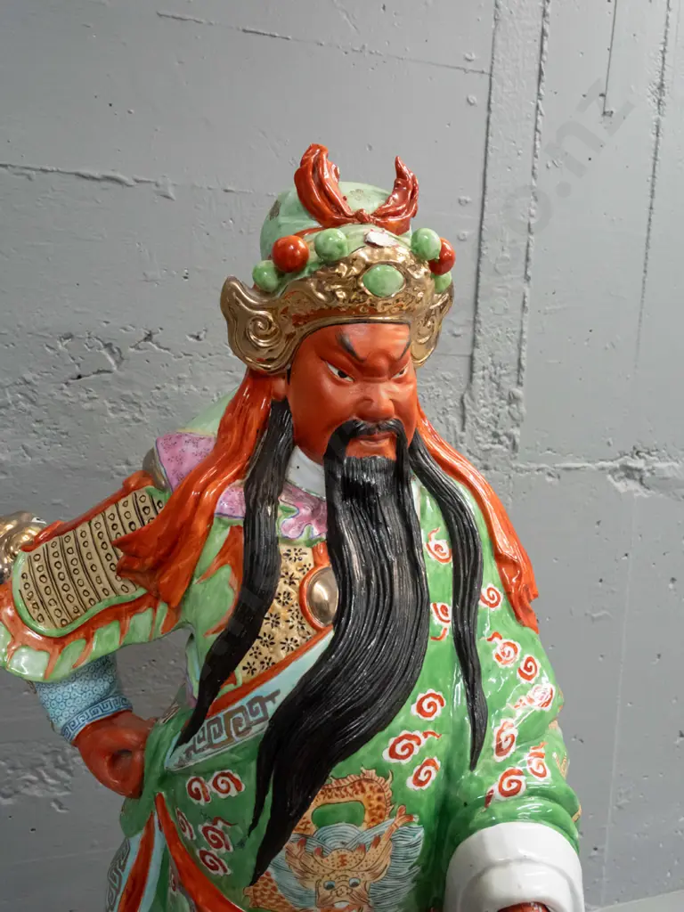 large Chinese heavy porcelain warrior figure with loose timber handled ceremonial staff - one hand loose, some chips and Image 1++
