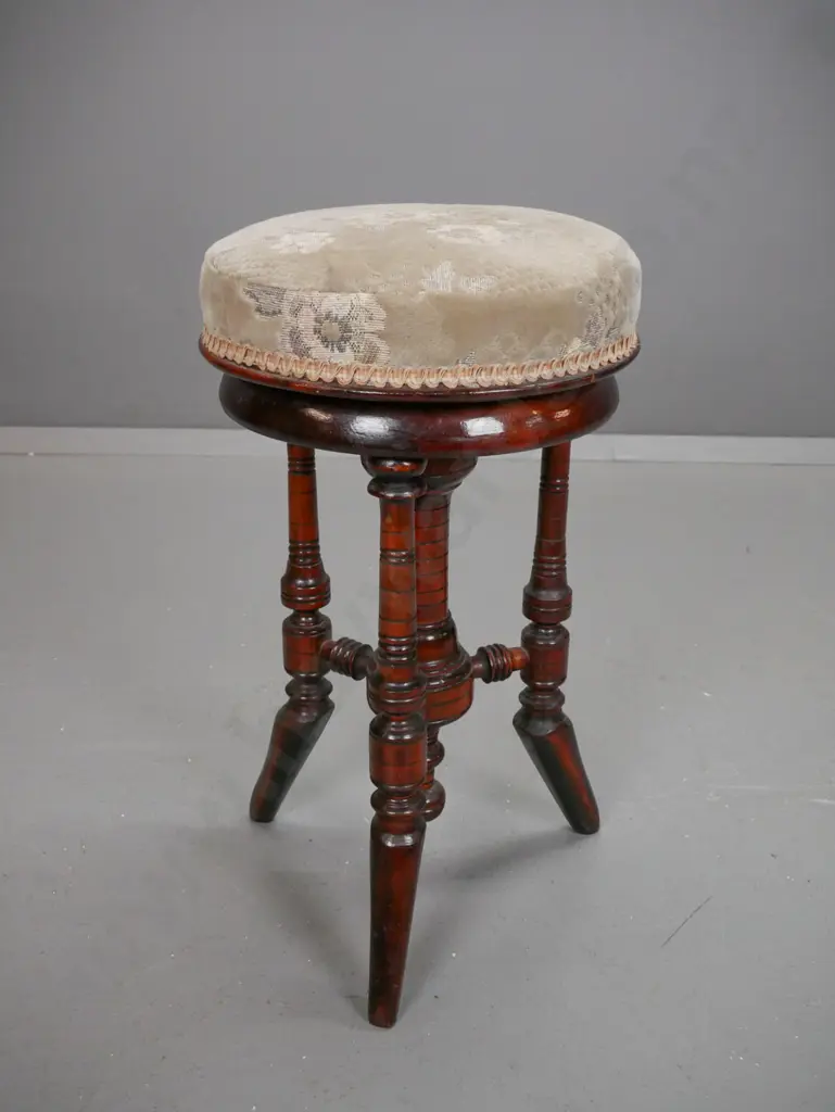 Edwardian dark-stained revolving top piano stool on turned column & 3 turned legs - borer holes in seat plate, some wear Image 1++