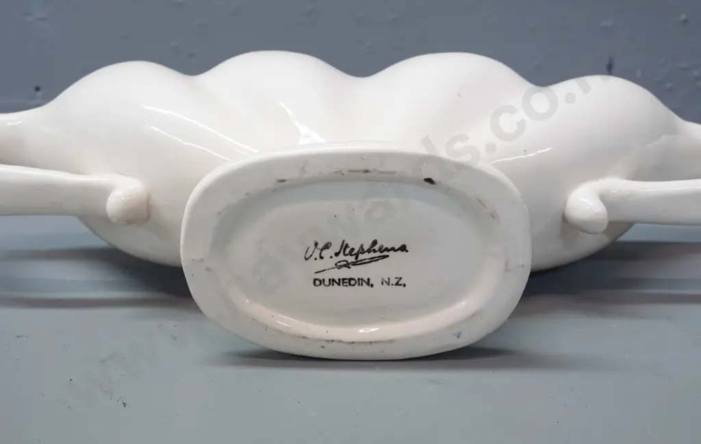 O.C. Stephens double-handled trough vase - cream glaze outer with turquoise inside. Hairline crack around one top of one Image 1++