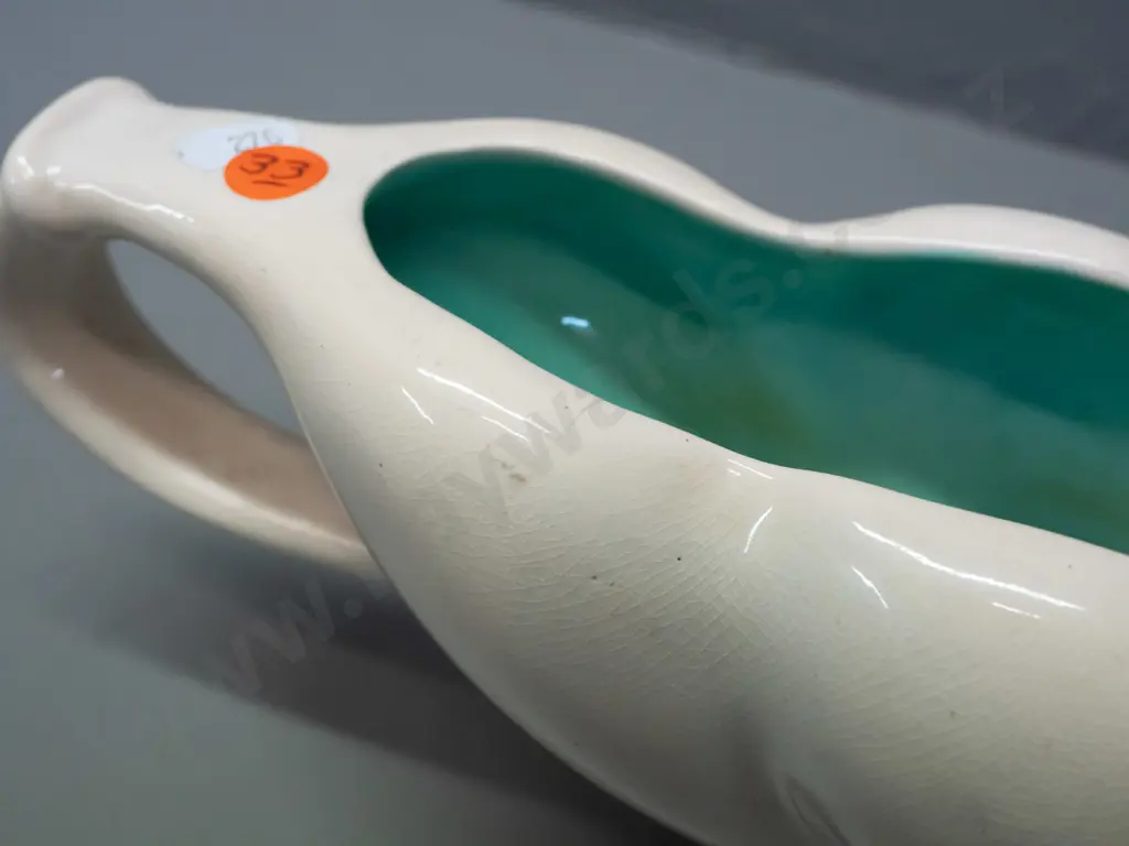 O.C. Stephens double-handled trough vase - cream glaze outer with turquoise inside. Hairline crack around one top of one Image 1++