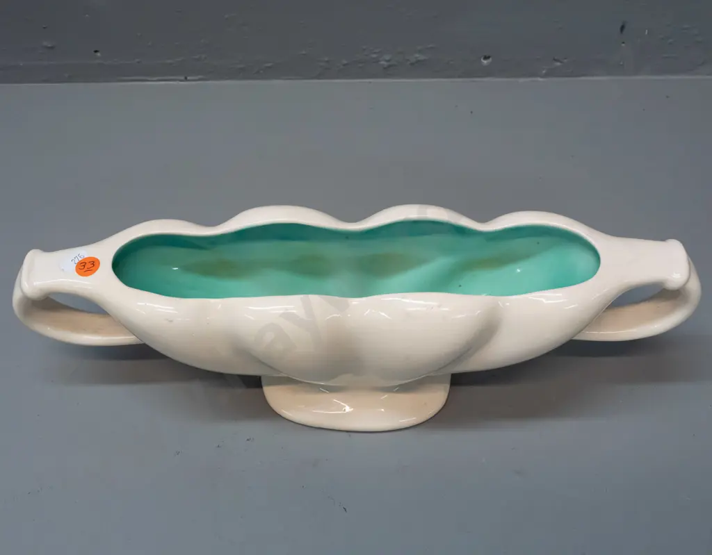 O.C. Stephens double-handled trough vase - cream glaze outer with turquoise inside. Hairline crack around one top of one Image 1++