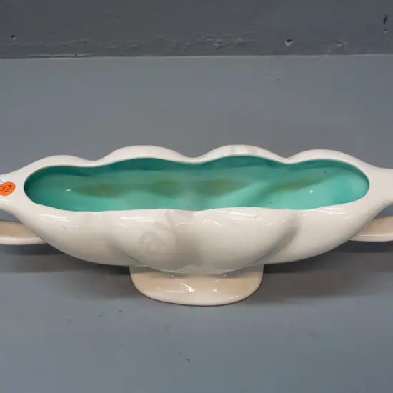 O.C. Stephens double-handled trough vase - cream glaze outer with turquoise inside. Hairline crack around one top of one