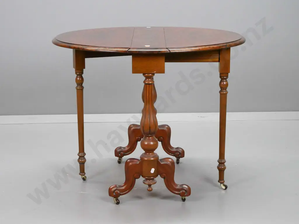 reproduction walnut topped Sutherland drop-leaf table with turned stretcher base on porcelain casters H-600 L-740 with Image 1++