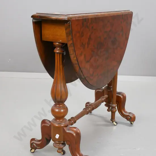 reproduction walnut topped Sutherland drop-leaf table with turned stretcher base on porcelain casters H-600 L-740 with