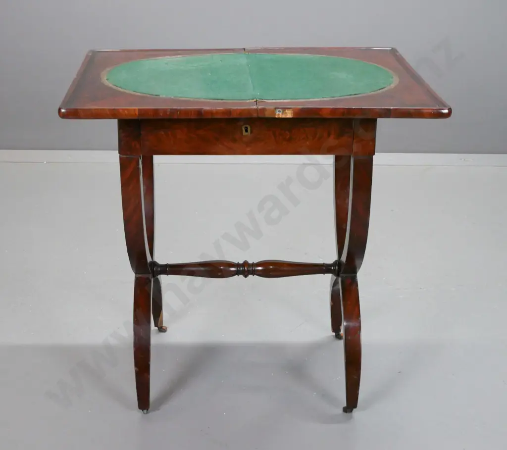 Regency flame mahogany swivel top games/work table, top with oval baize panel & tooled leather edge, frieze drawer, Image 1++
