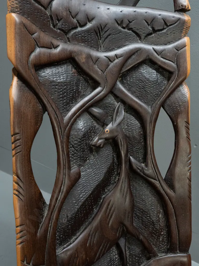 2-piece collapsible carved and pierced African hardwood chair with elephant, antelope, etc. - small crack in seat H-770 Image 1++