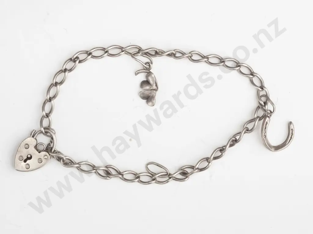 silver charm bracelet with 2 charms Image 1++