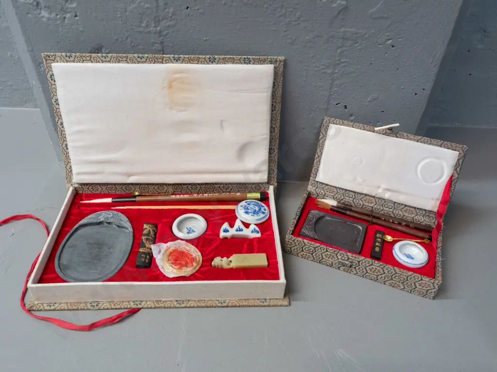 2 Chinese painting / desk sets in fabric covered cases, w/ various porcelain containers, brushes, pallette, soapstone Image 1++