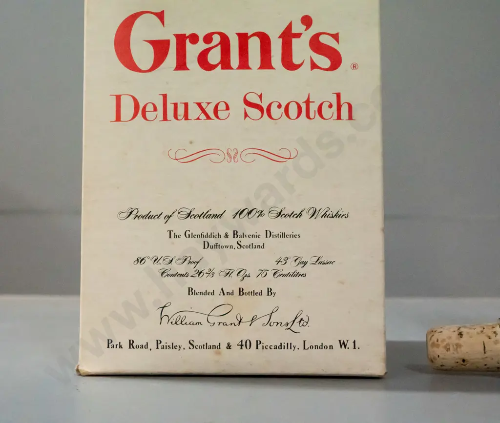 Grant's scotch whisky in handled jug, still sealed, with unused stopper and original box. Jug H-190 Image 1++