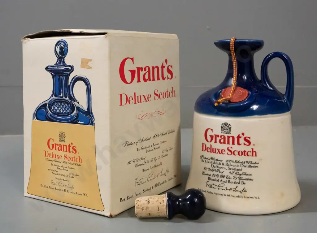 Grant's scotch whisky in handled jug, still sealed, with unused stopper and original box. Jug H-190 Image 1++