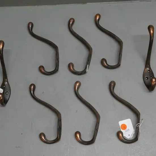 8 vintage cast metal copper finish double coat hooks - minor surface corrosion H-140 D-80