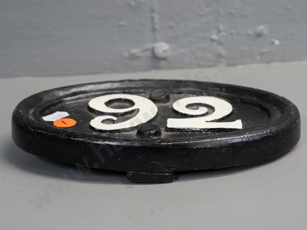 heavy cast metal oval (railway?) plaque with white-painted "92" on black background, has 2 mounting holes H-110 W-180 Image 1++