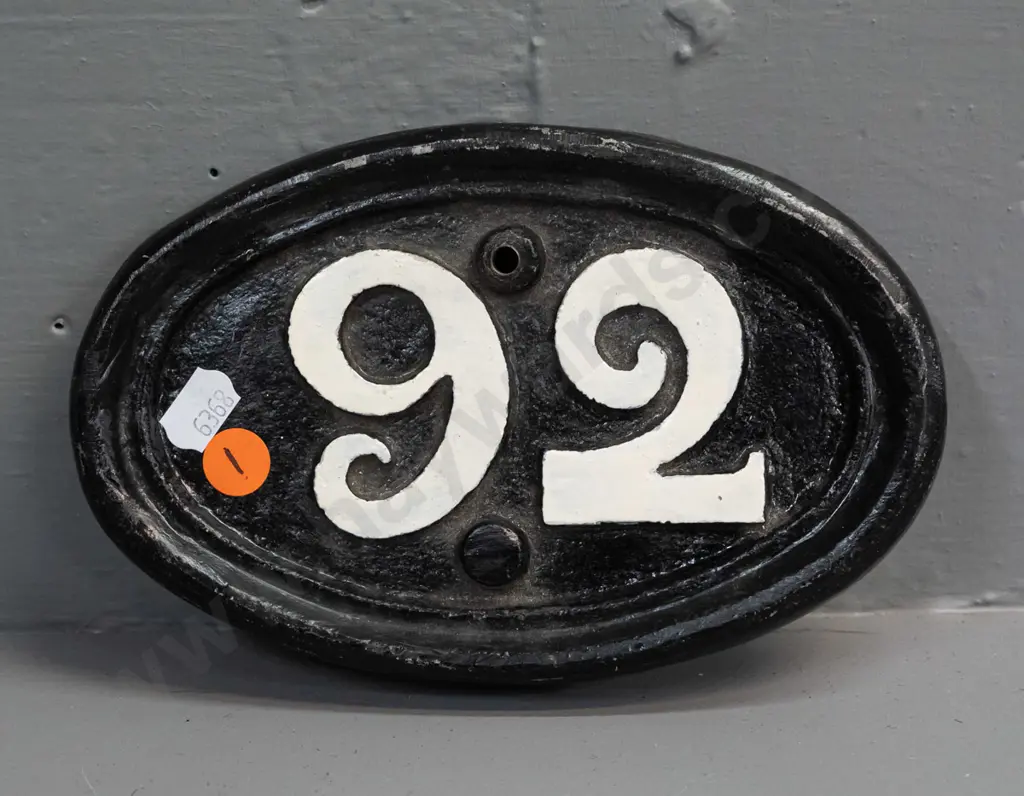 heavy cast metal oval (railway?) plaque with white-painted "92" on black background, has 2 mounting holes H-110 W-180 Image 1++