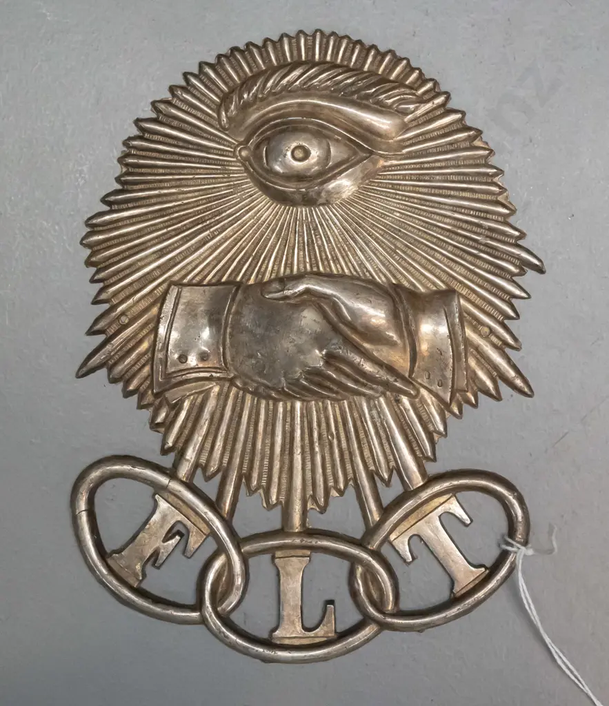 cast metal plaque with Oddfellows hands & eye imagery and letters FLT (Friendship, Love, and Truth) H155 W120 Image 1++