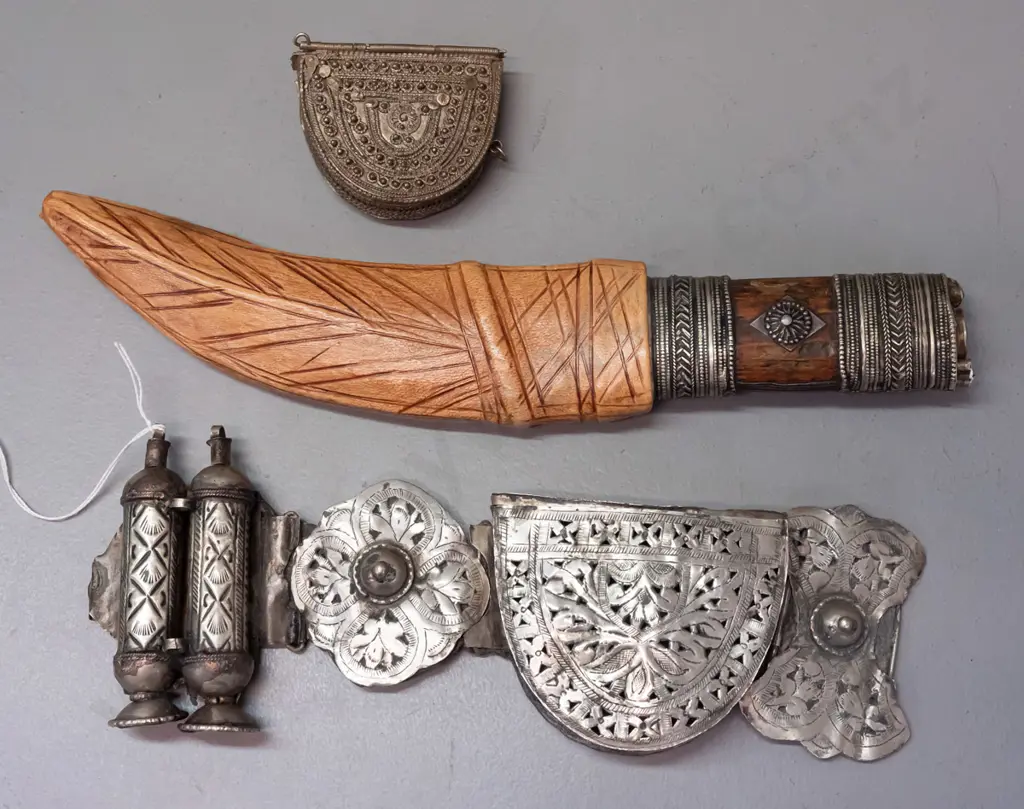 ornate small Jambiya / dagger from Sadaa Yemen - timber handle with metal decoration, inset red stone, leather sheath Image 1++