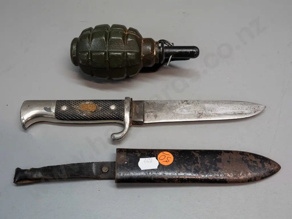 reproduction or dummy grenade and a knife marked Solingen / Armeso / Made in Germany, with metal scabbard, has had Image 1++
