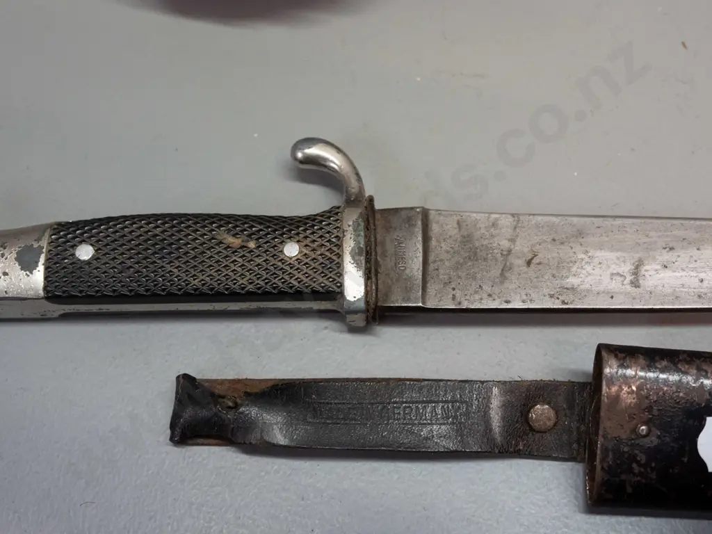 reproduction or dummy grenade and a knife marked Solingen / Armeso / Made in Germany, with metal scabbard, has had Image 1++